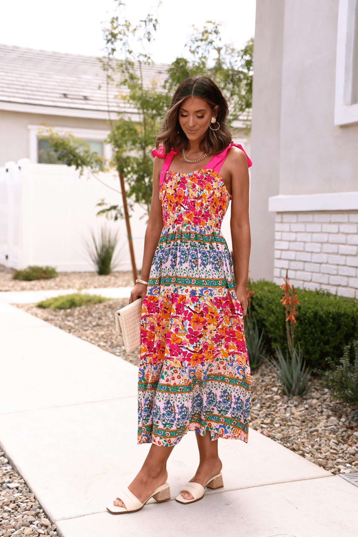Side view pink floral midi dress