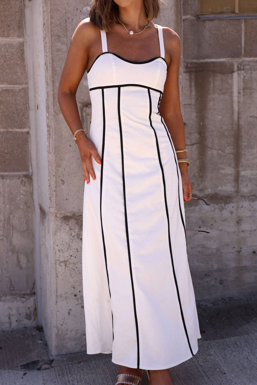 Maxi dress with contrast black trim on model